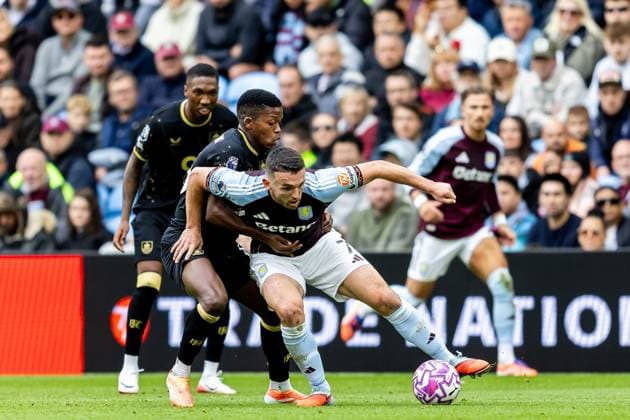 Aston Villa v Burnley Premier League 05 10 2025. Aston Villa midfielder John McGinn (7) battles for possession during the Premier League match between Aston Villa and Burnley at Villa Park, Birmingham, England on 5 October 2025. Birmingham Villa Park West Midlands England Editorial use only DataCo restrictions apply See www.football-dataco.com , Copyright: xManjitxNarotrax PSI-23003-0040
