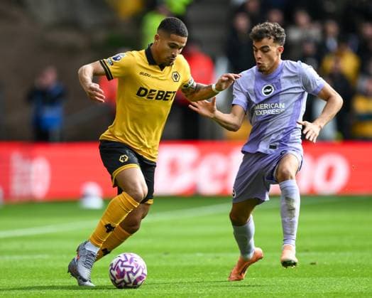 Wolverhampton, England, 5th October 2025. Joao Gomes of Wolverhampton Wanderers takes on Yasin Ayari of Brighton & Hove Albionduring the Wolverhampton Wanderers vs Brighton and Hove Albion Premier League match at Molineux, Wolverhampton. Picture credit should read: Craig Thomas Sportimage EDITORIAL USE ONLY. No use with unauthorised audio, video, data, fixture lists, club league logos or live services. Online in-match use limited to 120 images, no video emulation. No use in betting, games or single club league player publications. SPI_041_CT_Wolves_v_Brighton SPI-4200-0041