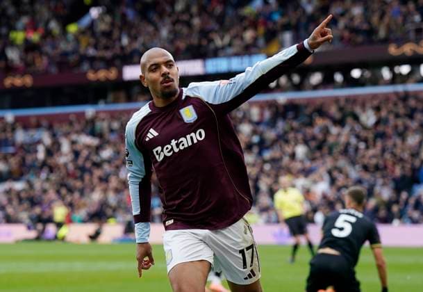 Birmingham, England, 5th October 2025. Donyell Malen of Aston Villa celebrates after scoring the second goal during the Aston Villa vs Burnley Premier League match at Villa Park, Birmingham. Picture credit should read: Andrew Yates Sportimage EDITORIAL USE ONLY. No use with unauthorised audio, video, data, fixture lists, club league logos or live services. Online in-match use limited to 120 images, no video emulation. No use in betting, games or single club league player publications. SPI_023_AY_VILLA_BURNLEY SPI-4198-0025