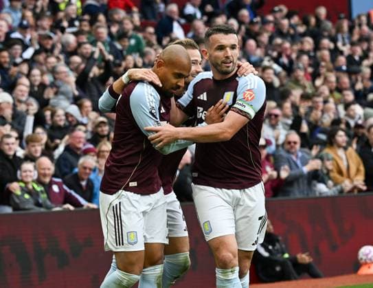 Donyell Malen of Aston Villa celebrates with Matty Cash and John McGinn after scoring the team s second goal Aston Villa v Burnley, Premier League, Football, Villa Park, Birmingham, UK - 05 Oct 2025Birmingham Villa Park United Kingdom EDITORIAL USE ONLY No use with unauthorised audio, video, data, fixture lists, club league logos or live services. Online in-match use limited to 120 images, no video emulation. No use in betting, games or single club league player publications. Copyright: xAnnaxGowthorpe Shutterstockx 15515860ag