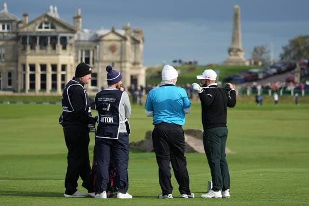 5th October 2025; The Old Course at St Andrews, Fife, Scotland; Alfred Dunhill Links Golf Championship, Final Round; Tyrrell Hatton and Robert MacIntyre wait for the green to clear before playing their tee shots at the 18th hole at The Old Course at St Andrews  AlecxBrown