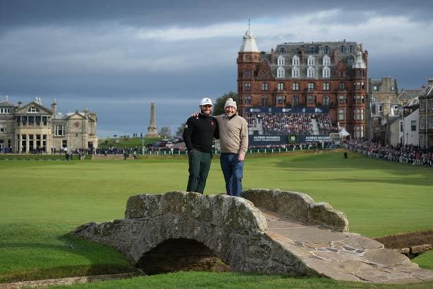 5th October 2025; The Old Course at St Andrews, Fife, Scotland; Alfred Dunhill Links Golf Championship, Final Round; Tyrrell Hatton and Jeff Hatton take a photo opportunity on the Swilcan Bridge before walking up the 18th fairway at The Old Course at St Andrews  AlecxBrown