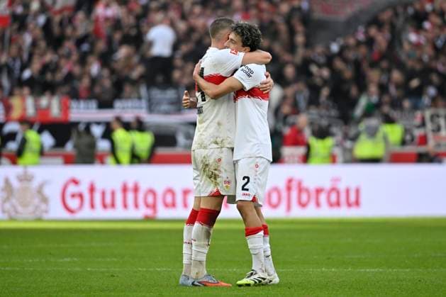 nach Spielende: Schlussjubel, Freude, Glueck, Jubel Ameen Al-Dakhil VfB Stuttgart (02) Jeff Chabot VfB Stuttgart (24) VfB Stuttgart vs 1. FC Heidenheim FCH 05.10.2025 DFL REGULATIONS PROHIBIT ANY USE OF PHOTOGRAPHS AS IMAGE SEQUENCES AND OR QUASI-VIDEO VfB Stuttgart vs 1. FC Heidenheim FCH