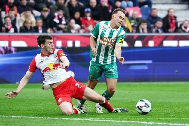SOCCER - BL, RBS vs Rapid SALZBURG,AUSTRIA,05.OCT.25 - SOCCER - ADMIRAL Bundesliga, Red Bull Salzburg vs SK Rapid Wien. Image shows Jacob Rasmussen (RBS) adn Nikolaus Wurmbrand (Rapid).  GEPAxpictures xDavidxGeieregger