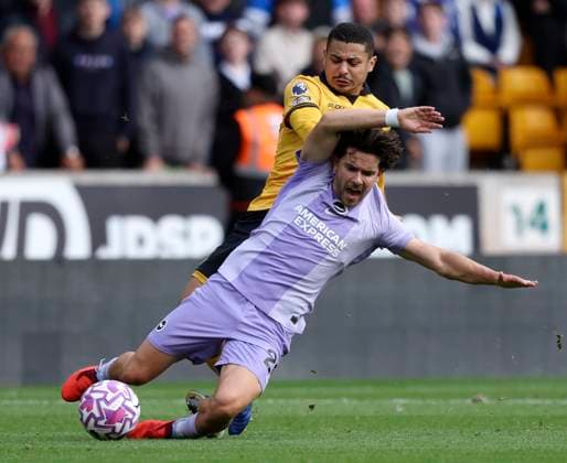 Wolverhampton Wanderers v Brighton & Hove Albion - Premier League Ferdi Kadioglu of Brighton and Hove Albion and Andre of Wolverhampton Wanderers challenge during the Premier League match between Wolverhampton Wanderers and Brighton & Hove Albion at Molineux on October 5, 2025 in Wolverhampton, England. Wolverhampton Molineux England United Kingdom Copyright: xNealxSimpson Sportsphoto APLx 14137399