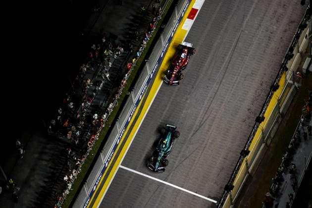 F1 - SINGAPORE GRAND PRIX 2025 14 ALONSO Fernando (spa), Aston Martin F1 Team AMR24, action 16 LECLERC Charles (mco), Scuderia Ferrari SF-25, action during the 2025 Formula 1 Singapore Grand Prix, 18th round of the 2025 FIA Formula One World Championship, WM, Weltmeisterschaft from October 3 to 5, 2025 on the Marina Bay Street Circuit, in Singapore - SingaporeSingapore  Copyright: xXavixBonillax