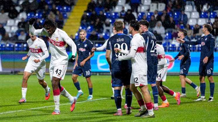 v.li.: Mirza Catovic (VfB II, 5), Torschütze Dan-Axel Zagadou (VfB II, 43), Leonidas Stergiou (VfB II, 42), Spieler vom VfB Stuttgart II U21, U 21 , jubeln über das Tor zum 0:1, Jubel, Torjubel, Torerfolg, celebrate the goal, goal, celebration, jubelt ueber das Tor, Freuen, Freude, freut sich, optimistisch, positiv, Spielszene, Highlight, Action, Aktion, 05.10.2025, Sinsheim (Deutschland), Fussball, 3. Liga, TSG 1899 Hoffenheim II - VfB Stuttgart II, DFB DFL REGULATIONS PROHIBIT ANY USE OF PHOTOGRAPHS AS IMAGE SEQUENCES AND OR QUASI-VIDEO.