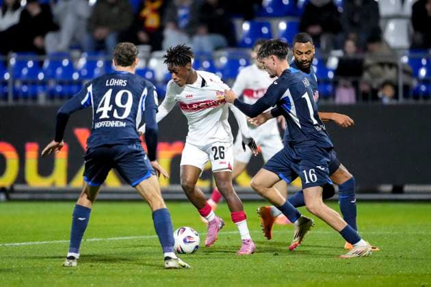 v.li.: Yannik Lührs (TSG II, 49), Justin Diehl (VfB II, 26), Yannis Hör (TSG II, 16), Ruben Reisig (TSG II, 17), Zweikampf, Spielszene, Duell, duel, tackle, tackling, Dynamik, Action, Aktion, 05.10.2025, Sinsheim (Deutschland), Fussball, 3. Liga, TSG 1899 Hoffenheim II - VfB Stuttgart II, DFB DFL REGULATIONS PROHIBIT ANY USE OF PHOTOGRAPHS AS IMAGE SEQUENCES AND OR QUASI-VIDEO.