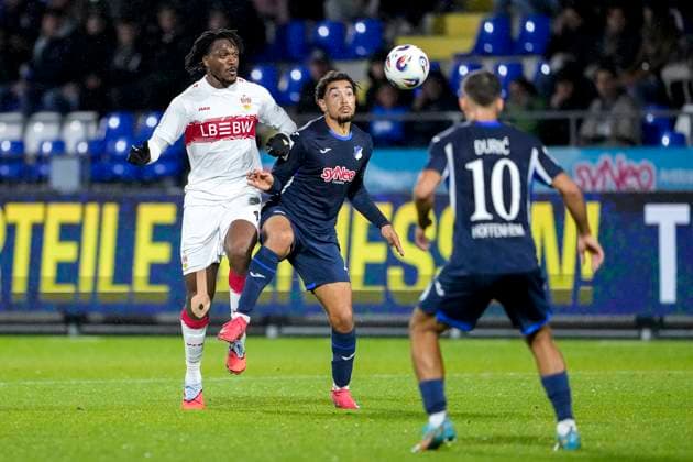 v.li.: Dan-Axel Zagadou (VfB II, 43), Ben Opoku Labes (TSG II, 45), Luka Djuric (Duric, TSG II, 10), Zweikampf, Spielszene, Duell, duel, tackle, tackling, Dynamik, Action, Aktion, 05.10.2025, Sinsheim (Deutschland), Fussball, 3. Liga, TSG 1899 Hoffenheim II - VfB Stuttgart II, DFB DFL REGULATIONS PROHIBIT ANY USE OF PHOTOGRAPHS AS IMAGE SEQUENCES AND OR QUASI-VIDEO.