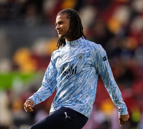 Brentford v Manchester City Premier League Nathan AkÃ of Manchester City warms up before the Premier League match at the Gtech Community Stadium, Brentford UK Newspapers OUT Copyright: xGraemexWilcocksonx FIL-22323-0134