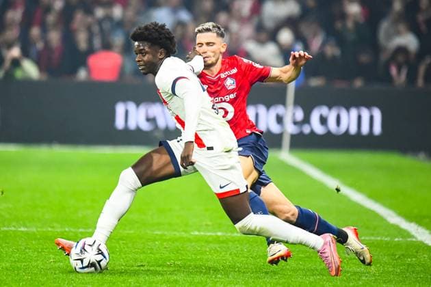 FOOTBALL : Lille OSC vs Paris SG - Ligue 1 - JournÃ e 7 - 05 10 2025 Quentin Ndjantou (Paris SG) Romain Perraud (Lille OSC) LilleFrance  Copyright: xBaptistexAutissierx