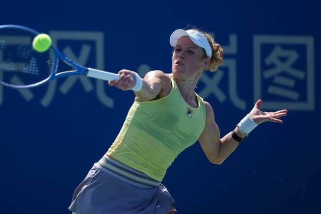 WUHAN, CHINA - OCTOBER 06: Laura Siegemund of Germany returns a shot in the Women s Singles Round of 64 match against Dayana Yastremska of Ukraine on day 3 of 2025 Wuhan Open at Optics Valley International Tennis Center on October 6, 2025 in Wuhan, Hubei Province of China.  Copyright: xVCGx 111595396581