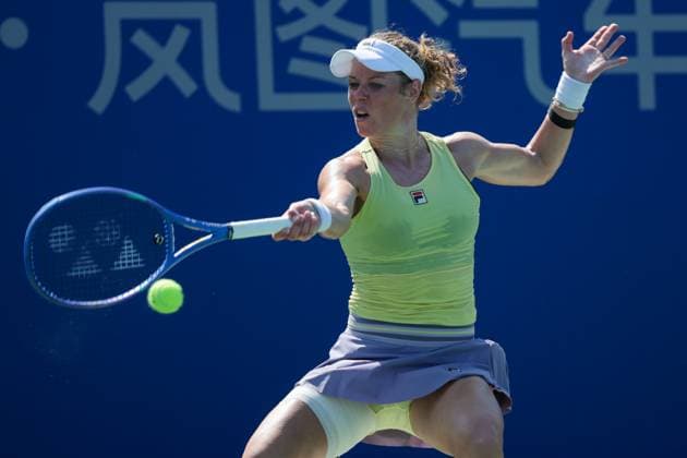 WUHAN, CHINA - OCTOBER 06: Laura Siegemund of Germany returns a shot in the Women s Singles Round of 64 match against Dayana Yastremska of Ukraine on day 3 of 2025 Wuhan Open at Optics Valley International Tennis Center on October 6, 2025 in Wuhan, Hubei Province of China.  Copyright: xVCGx 111595396578