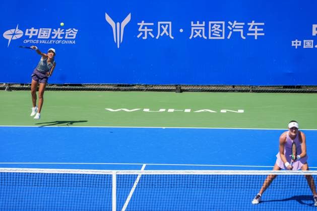WUHAN, CHINA - OCTOBER 06: Zhang Shuai of China and Kristina Mladenovic of France return a shot in the Women s Doubles Round of 32 match against Shuko Aoyama of Japan and Cristina Bucsa of Spain on day 3 of 2025 Wuhan Open at Optics Valley International Tennis Center on October 6, 2025 in Wuhan, Hubei Province of China.  Copyright: xVCGx 111595399802