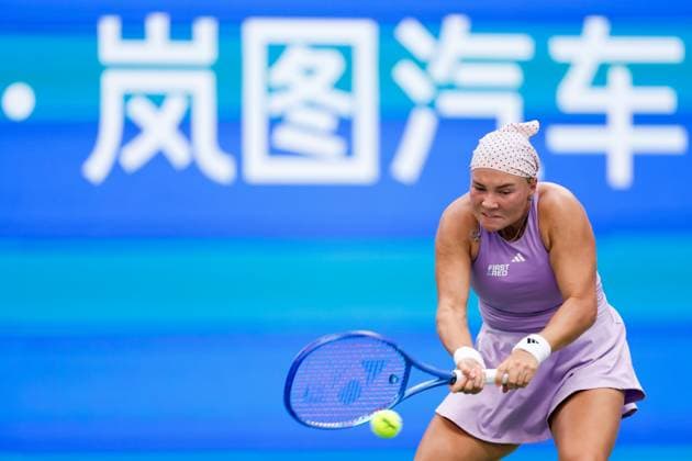 WUHAN, CHINA - OCTOBER 06: Diana Shnaider returns a shot in the Women s Singles Round of 64 match against Katerina Siniakova of Czech Republic on day 3 of 2025 Wuhan Open at Optics Valley International Tennis Center on October 6, 2025 in Wuhan, Hubei Province of China.  Copyright: xVCGx 111595400598