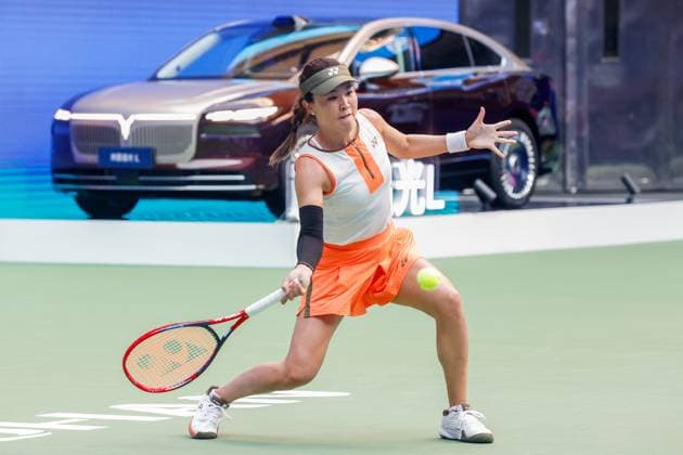 WUHAN, CHINA - OCTOBER 06: Zhu Lin of China returns a shot in the Women s Singles Round of 64 match against Maya Joint of Australia on day 3 of 2025 Wuhan Open at Optics Valley International Tennis Center on October 6, 2025 in Wuhan, Hubei Province of China.  Copyright: xVCGx 111595410690