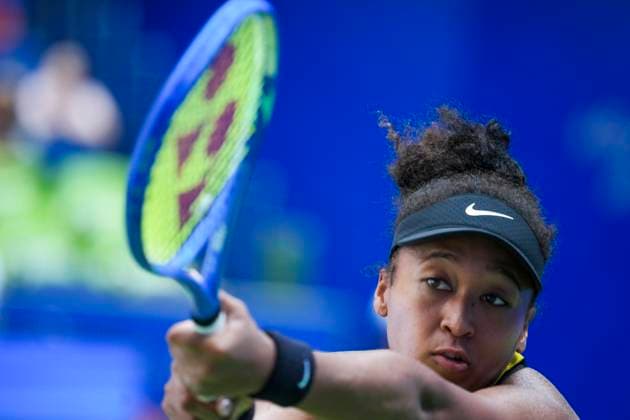 WUHAN, CHINA - OCTOBER 07: Naomi Osaka of Japan returns a shot in the Women s Singles Round of 64 match against Leylah Fernandez of Canada on day 4 of 2025 Wuhan Open at Optics Valley International Tennis Center on October 7, 2025 in Wuhan, Hubei Province of China.  Copyright: xVCGx 111595619515