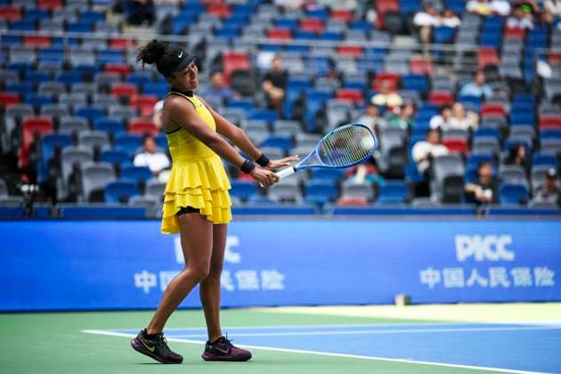 WUHAN, CHINA - OCTOBER 07: Naomi Osaka of Japan returns a shot in the Women s Singles Round of 64 match against Leylah Fernandez of Canada on day 4 of 2025 Wuhan Open at Optics Valley International Tennis Center on October 7, 2025 in Wuhan, Hubei Province of China.  Copyright: xVCGx 111595619486