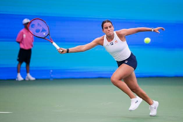 WUHAN, CHINA - OCTOBER 07: Emma Navarro of the United States returns a shot in the Women s Singles Round of 64 match against Zhang Shuai of China on day 4 of 2025 Wuhan Open at Optics Valley International Tennis Center on October 7, 2025 in Wuhan, Hubei Province of China.  Copyright: xVCGx 111595682204