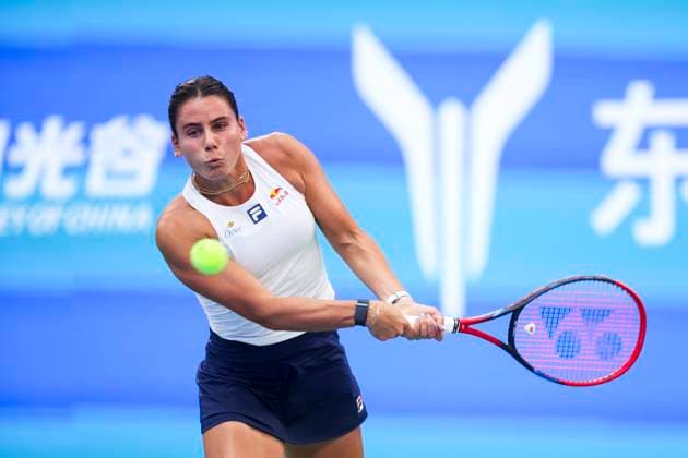 WUHAN, CHINA - OCTOBER 07: Emma Navarro of the United States returns a shot in the Women s Singles Round of 64 match against Zhang Shuai of China on day 4 of 2025 Wuhan Open at Optics Valley International Tennis Center on October 7, 2025 in Wuhan, Hubei Province of China.  Copyright: xVCGx 111595682024