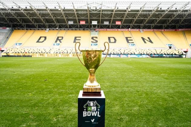 Trophy, GFL Bowl trophy stands on the lawn of Rudolf-Harbig-Stadion Dresden Erima GFL Bowl 2025, press conference, PK, Pressekonferenz Potsdam Royals vs Dresden Monarchs Copyright: xFootxBowl PatrickxKlixx
