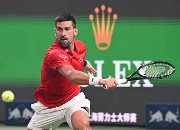 (251007) -- SHANGHAI, Oct. 7, 2025 -- Novak Djokovic competes during the men s singles round of 16 match between Novak Djokovic of Serbia and Jaume Munar of Spain at the ATP, Tennis Herren World Tour Shanghai Masters tennis tournament in Shanghai, east China, Oct. 7, 2025. ) (SP)CHINA-SHANGHAI-TENNIS-ATP TOUR-SHANGHAI MASTERS-MEN S SINGLES (CN) ChenxHaoming 