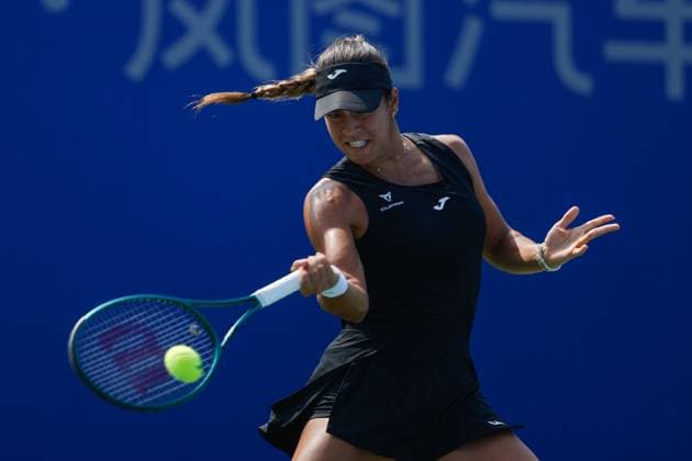 WUHAN, CHINA - OCTOBER 08: Jessica Bouzas Maneiro of Spain returns a shot in the Women s Singles Round of 32 match against Iva Jovic of the United States on day 5 of 2025 Wuhan Open at Optics Valley International Tennis Center on October 8, 2025 in Wuhan, Hubei Province of China.  Copyright: xVCGx 111595844889