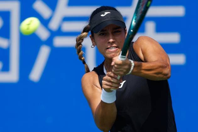 WUHAN, CHINA - OCTOBER 08: Jessica Bouzas Maneiro of Spain returns a shot in the Women s Singles Round of 32 match against Iva Jovic of the United States on day 5 of 2025 Wuhan Open at Optics Valley International Tennis Center on October 8, 2025 in Wuhan, Hubei Province of China.  Copyright: xVCGx 111595844874