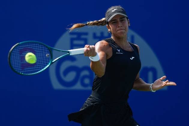 WUHAN, CHINA - OCTOBER 08: Jessica Bouzas Maneiro of Spain returns a shot in the Women s Singles Round of 32 match against Iva Jovic of the United States on day 5 of 2025 Wuhan Open at Optics Valley International Tennis Center on October 8, 2025 in Wuhan, Hubei Province of China.  Copyright: xVCGx 111595844876