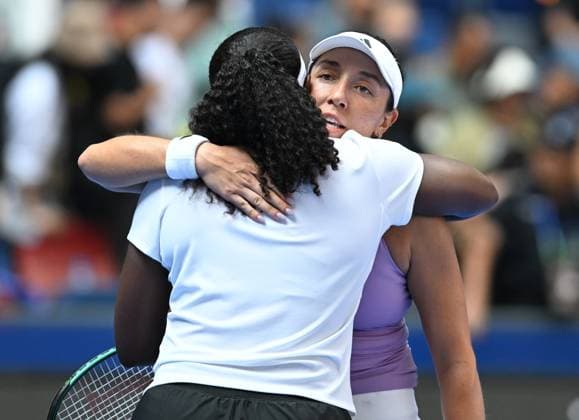 (251008) -- WUHAN, Oct. 8, 2025 -- Jessica Pegula of the United States hugs Hailey Baptiste of the United States after their women s singles round of 32 match at the 2025 Wuhan Open tennis tournament in Wuhan, central China s Hubei Province, Oct. 8, 2025. ) (SP)CHINA-WUHAN-TENNIS-WUHAN OPEN-WOMEN S SINGLES (CN) ChengxMin 