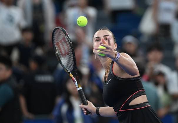 (251008) -- WUHAN, Oct. 8, 2025 -- Aryna Sabalenka of Belarus send the ball to the spectators after the women s singles round of 32 match against Rebecca Sramkova of Slovakia at the 2025 Wuhan Open tennis tournament in Wuhan, central China s Hubei Province, Oct. 8, 2025. ) (SP)CHINA-WUHAN-TENNIS-WUHAN OPEN-WOMEN S SINGLES (CN) ChengxMin 