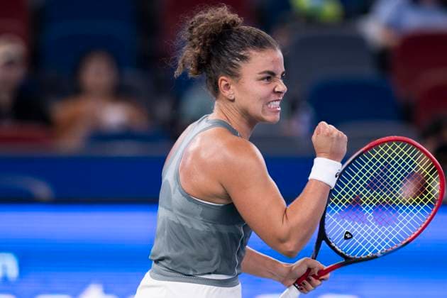 (251008) -- WUHAN, Oct. 8, 2025 -- Jasmine Paolini of Italy celebrates scoring during the women s singles round of 32 match against Yuan Yue of China at the 2025 Wuhan Open tennis tournament in Wuhan, central China s Hubei Province, Oct. 8, 2025. ) (SP)CHINA-WUHAN-TENNIS-WUHAN OPEN-WOMEN S SINGLES (CN) WuxZhizun 