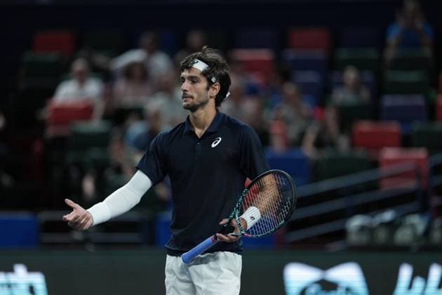 (251008) -- SHANGHAI, Oct. 8, 2025 -- Lorenzo Musetti of Italy reacts during the men s singles round of 16 match agaisnt Felix Auger-Aliassime of Canada at the ATP, Tennis Herren World Tour Shanghai Masters tennis tournament in Shanghai, east China, Oct. 8, 2025. (SP)CHINA-SHANGHAI-TENNIS-ATP TOUR-SHANGHAI MASTERS-MEN S SINGLES (CN) DingxTing 