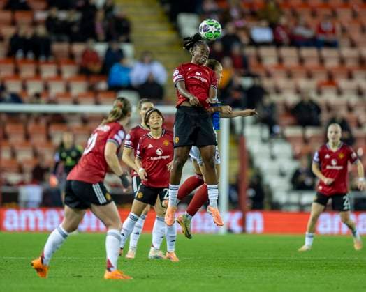 8th October 2025; Leigh Sports Village, Manchester, England; Womens Champions League Football, Manchester United, ManU versus Valerenga; Melvine Malard of Manchester United Women heads the ball clear  TimxWilliams