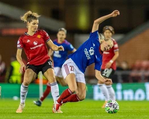 8th October 2025; Leigh Sports Village, Manchester, England; Womens Champions League Football, Manchester United, ManU versus Valerenga; Karina Saevik of Valerenga Fotball Damer is tackled by Dominique Janssen of Manchester United Women  TimxWilliams
