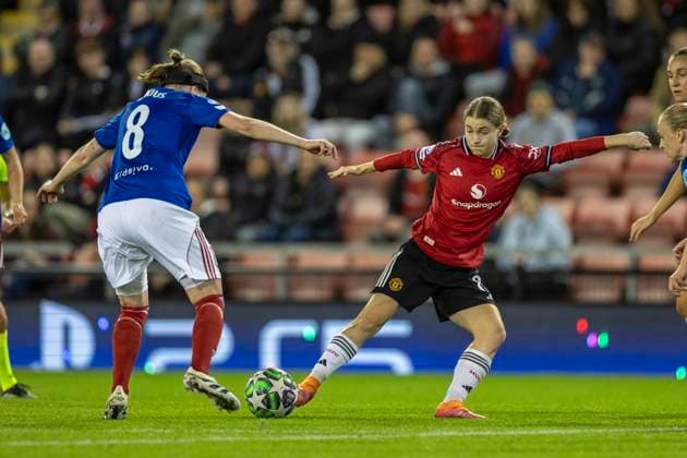 8th October 2025; Leigh Sports Village, Manchester, England; Womens Champions League Football, Manchester United, ManU versus Valerenga; Jess Park of Manchester United Women under pressure from Linn Vickius of Valerenga Fotball Damer  TimxWilliams
