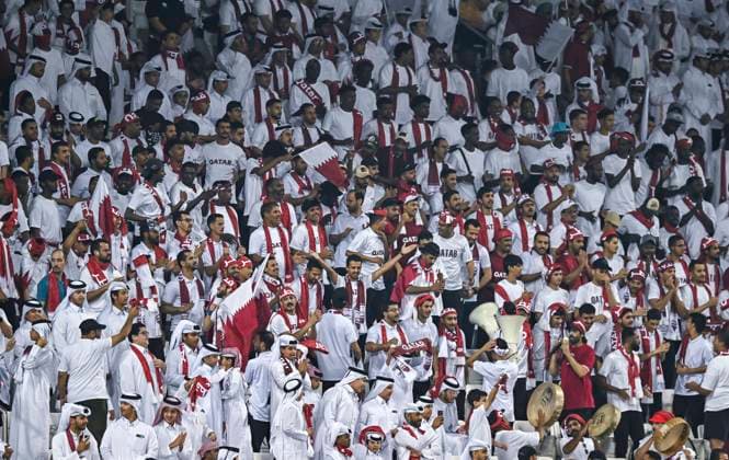QATAR V OMAN-2026 FIFA World Cup, WM, Weltmeisterschaft, Fussball ASIAN QUALIFIER PLAYOFFS Qatar supporters cheer for their team during the FIFA World Cup 2026 AFC Asian qualifiers playoffs group A match between Qatar v Oman at Jassim Bin Hamad Stadium in Doha, Qatar, on October 8, 2025. DOHA Qatar Copyright: xNOUSHADx