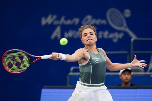 WUHAN, CHINA - OCTOBER 09: Jasmine Paolini of Italy returns a shot in the Women s Singles Round of 16 match against Clara Tauson of Denmark on day 6 of 2025 Wuhan Open at Optics Valley International Tennis Center on October 9, 2025 in Wuhan, Hubei Province of China.  Copyright: xVCGx 111596125292