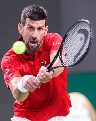 (251009) -- SHANGHAI, Oct. 9, 2025 -- Novak Djokovic hits a return during the men s singles quarterfinal between Novak Djokovic of Serbia and Zizou Bergs of Belgium at the ATP, Tennis Herren World Tour Shanghai Masters tennis tournament in Shanghai, east China, Oct. 9, 2025. ) (SP)CHINA-SHANGHAI-TENNIS-ATP TOUR-SHANGHAI MASTERS-MEN S SINGLES (CN) DingxTing 