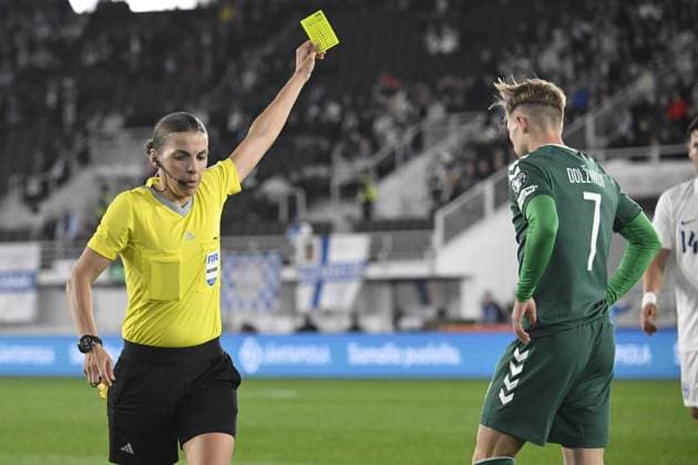 Referee Stephanie Frappart of France gives a yellow card to 7 Artur Dolznikov of Lithuania during the 2026 FIFA World Cup, WM, Weltmeisterschaft, Fussball qualification UEFA Group G football match Finland vs Lithuania in Helsinki, Finland on October 9, 2025. Helsinki Finland LKFTJK20251009192605XCCO  Copyright: xMarkkuxUlanderx LKFTJK20251009192605XCCO