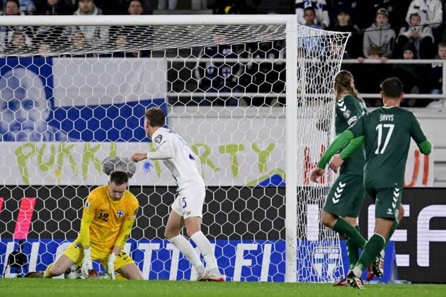 Finland s goalkeeper 12 Viljami Sinisalo saves a ball during the 2026 FIFA World Cup, WM, Weltmeisterschaft, Fussball qualification UEFA Group G football match Finland vs Lithuania in Helsinki, Finland on October 9, 2025. Helsinki Finland LKFTJK20251009204341TUIS  Copyright: xMarkkuxUlanderx LKFTJK20251009204341TUIS