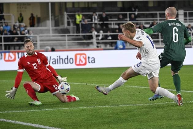 Finland s 16 Topi Keskinen try to score past goalkeeper 12 Tomas Svedkauskas and 6 Modestas Vorobjovas of Lithuania during the 2026 FIFA World Cup, WM, Weltmeisterschaft, Fussball qualification UEFA Group G football match Finland vs Lithuania in Helsinki, Finland on October 9, 2025. Helsinki Finland LKFTJK20251009205721YVAB  Copyright: xMarkkuxUlanderx LKFTJK20251009205721YVAB