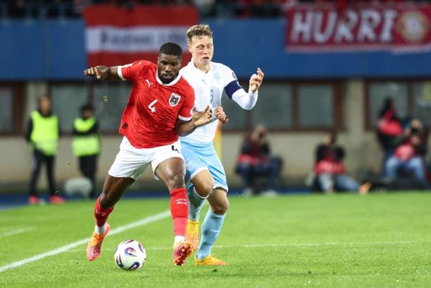 SOCCER - FIFA WC quali, AUT vs SMR VIENNA,AUSTRIA,09.OCT.25 - SOCCER - FIFA World Cup, WM, Weltmeisterschaft, Fussball 2026, European Qualifiers, group stage, OEFB international match, Länderspiel, Nationalmannschaft Austria vs San Marino. Image shows Kevin Danso (AUT) and Nicola Nanni (SMR). GEPAxpictures xArminxRauthner