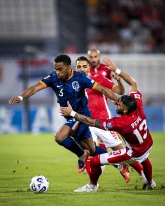 ATTARD - (l-r) JurriÃ«n Timber of the Netherlands and Enrico Pepe of Malta at the National Stadium during the Dutch national team, Nationalteam s 2026 FIFA World Cup, WM, Weltmeisterschaft, Fussball qualifying match against Malta. ANP KOEN VAN WEEL xVIxANPxSportx xxANPxIVx 538793206 originalFilename: 538793206.jpg