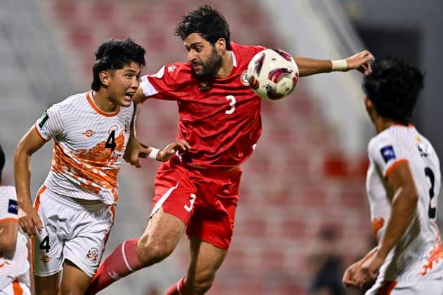LEBANON v BHUTAN-AFC ASIAN CUP 2027 QUALIFIER THIRD ROUND Khalil Khamis (R) of Lebanon and Tenzin Norbu of Bhutan in action during the AFC Asian Cup 2027 Qualifier third round Group B match between Lebanon and Bhutan at Grand Hamad Stadium in Doha, Qatar, on October 9, 2025. DOHA Qatar Copyright: xNOUSHADx