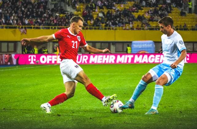 Fussball Österreich, FIFA WM Qualifikation Europa UEFA 2026, Spieltag 7 - ÖFB Österreich vs. San Marino - Ernst-Happel-Stadion (Wien, Österreich): Nikolaus Wurmbrand (Österreich, 21) mit Alessandro Tosi (San Marino, 12) Copyright: xLukasxBierederx
