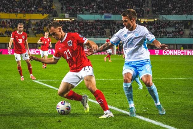 Fussball Österreich, FIFA WM Qualifikation Europa UEFA 2026, Spieltag 7 - ÖFB Österreich vs. San Marino - Ernst-Happel-Stadion (Wien, Österreich): Nikolaus Wurmbrand (Österreich, 21) mit Alessandro Tosi (San Marino, 12) Copyright: xLukasxBierederx