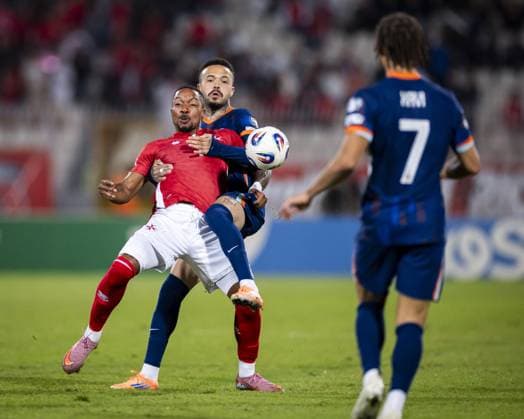 ATTARD - (l-r) Kemar Reid of Malta and Quilindschy Hartman of the Netherlands at the National Stadium during the Dutch national team, Nationalteam s 2026 FIFA World Cup, WM, Weltmeisterschaft, Fussball qualifying match against Malta. ANP KOEN VAN WEEL xVIxANPxSportx xxANPxIVx 538803328 originalFilename: 538803328.jpg