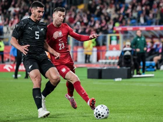 October 9, 2025, Chorzow, Poland: Polish football player Krzysztof Piateki and Michael Boxal of New Zealand seen in action during the friendly match between Poland and New Zealand at Silesia Stadium. Final score; Poland wins 1:0. Chorzow Poland - ZUMAs197 20251009_aaa_s197_401 Copyright: xDominikaxZarzyckax