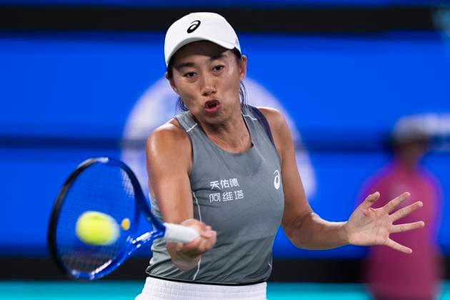 (251010) -- WUHAN, Oct. 10, 2025 -- Zhang Shuai of China hits a return during the women s singles round of 16 match against Coco Gauff of the United States at the 2025 Wuhan Open tennis tournament in Wuhan, central China s Hubei Province, Oct. 9, 2025. ) (SP)CHINA-WUHAN-TENNIS-WUHAN OPEN-WOMEN S SINGLES (CN) WuxZhizun 
